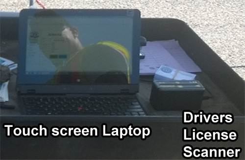 Touch screen laptop and drivers license scanner.