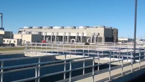 Look closely & see recycled water inside the cooling tower.