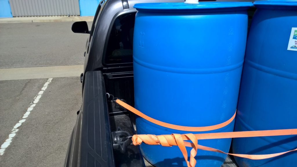 55 gallons drums in pickup truck.