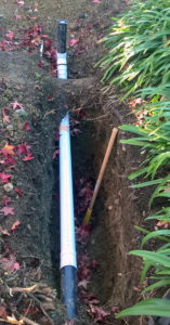 Infiltration trench dug 2 feet below drain pipe.