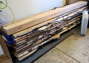 Wood stacked in garage to dry.